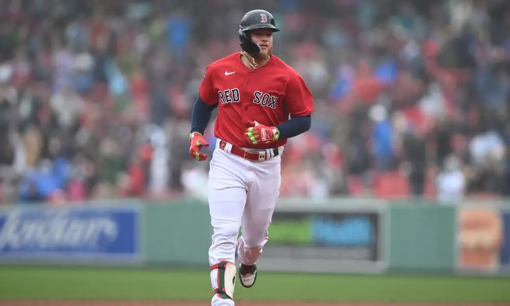 Alex Verdugo of the Boston Red Sox trots home after a home run.