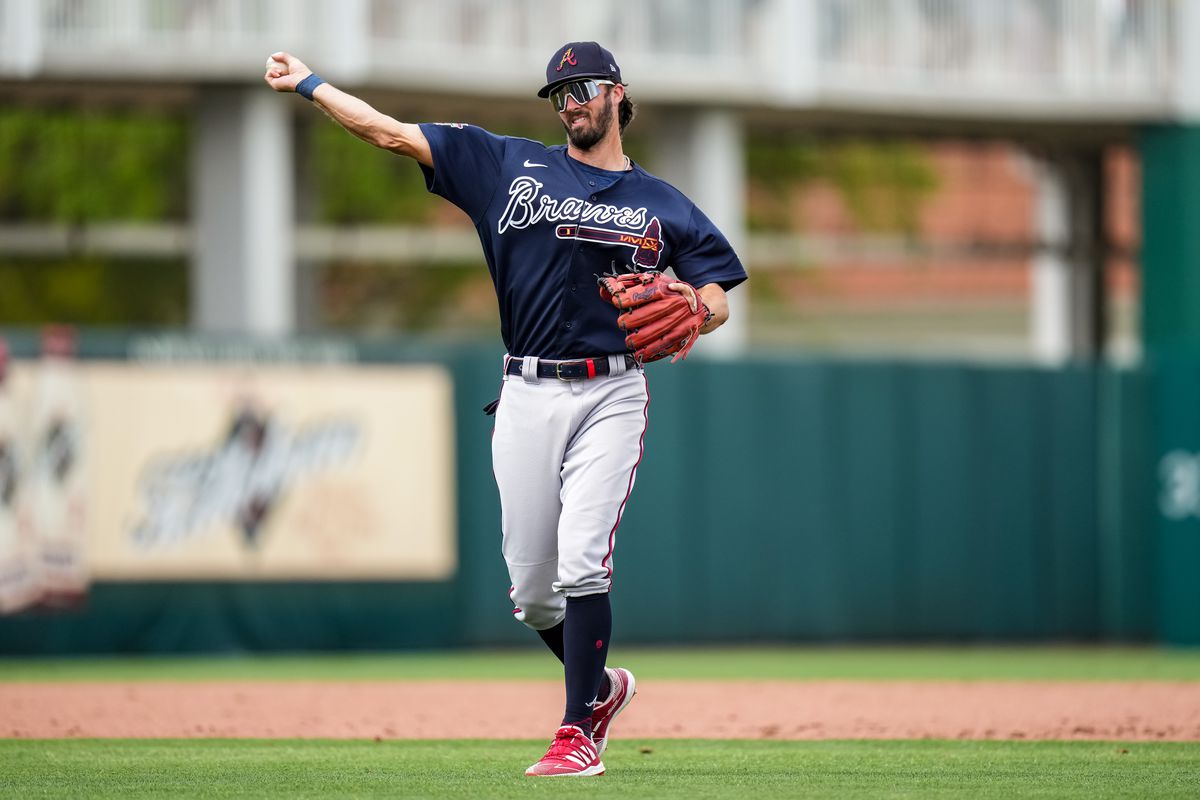 a baseball player throwing a baseball